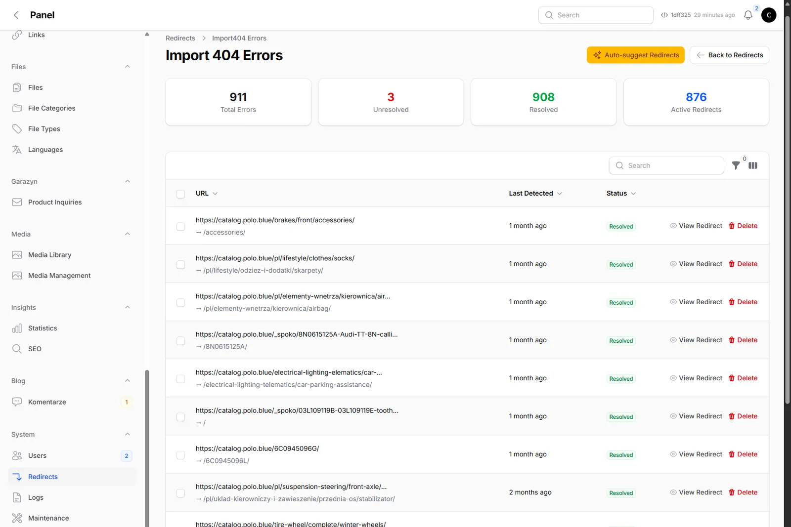 Import 404 Errors page with 911 total errors counter, resolution status per URL and Auto-suggest Redirects button